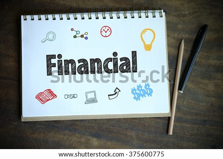drawing FINANCIAL concept notebook on table wood , business concept , business idea