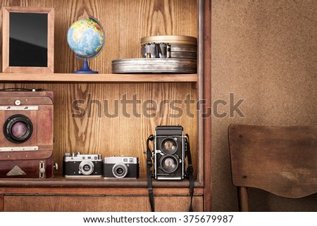 Photographer's cupboard. Vintage cameras. Vintage atelier.