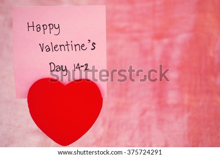 Paperclip red heart with message card of Valentine's day