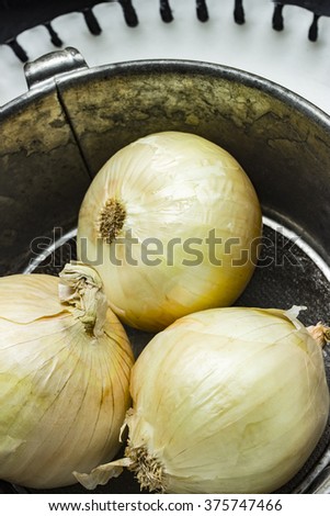 Several raw onions as a whole