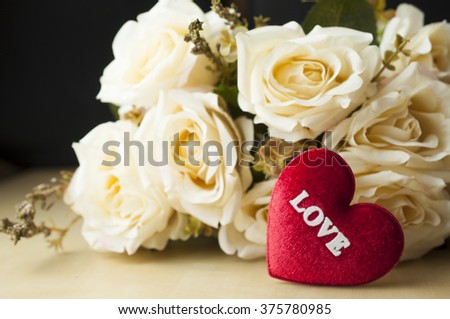 Roses with heart symbol background