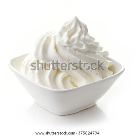 bowl of whipped cream isolated on white background Royalty-Free Stock Photo #375824794