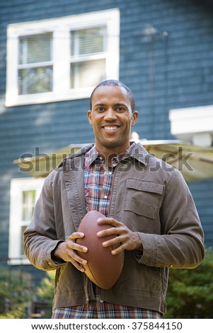 Man holding an American football