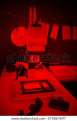 Photographic enlargers and accessories for the printing of old photos lighting red lamp