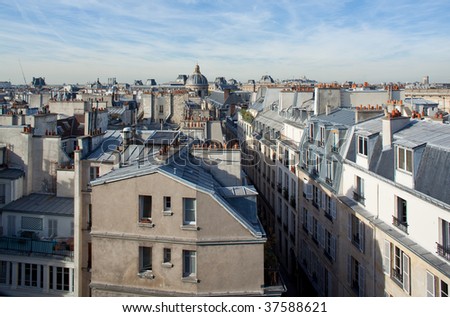 The roofs of Paris with the louvre in background by the afternoon (panorama).