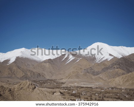 Mountain with snow and the blue sky
