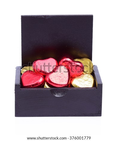 Love hearts in gift black box on white background, valentines day concept.