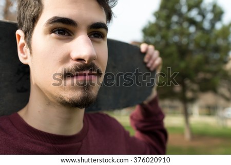 Face of a Skater in a City