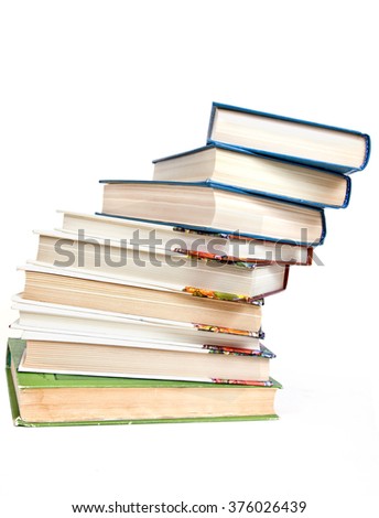 Falling pile of books it is isolated on a white background