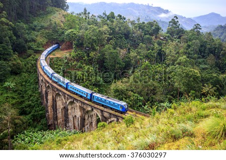 Train on the Nine Arch Bridge in Sri Lanka Royalty-Free Stock Photo #376030297