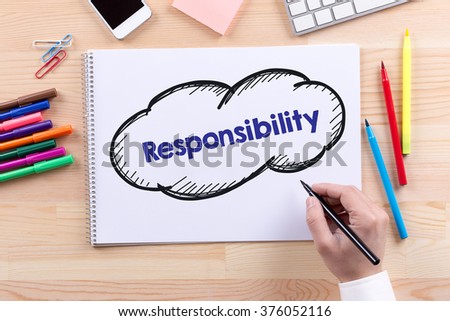 Man with a Notepad written Responsibility Concept