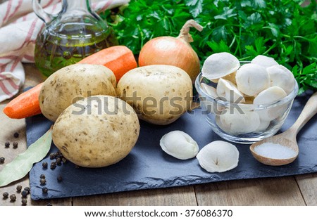 Ingredients for soup with pelmeni (russian dumplings)