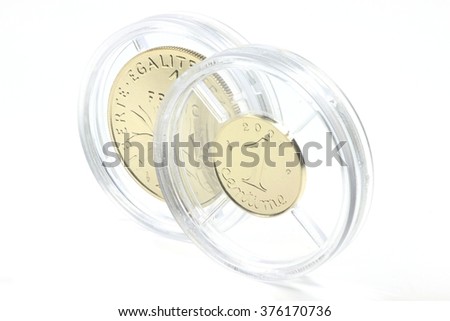 special gold issues of the French 1 Centime and 1 Franc coins (translation: freedom - equality - fraternity)