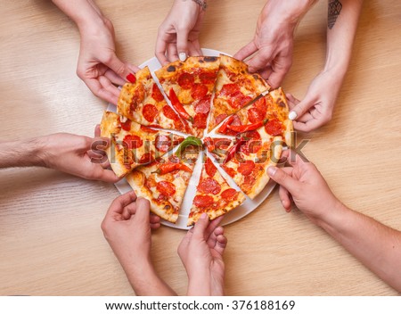 hand drawn on pieces of pizza Royalty-Free Stock Photo #376188169