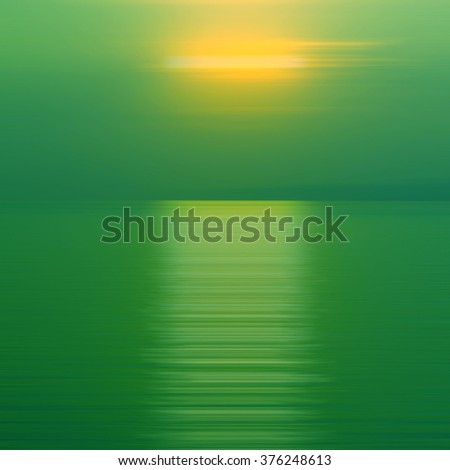 Abstract background motion blurred of refraction in water with sunset on the sea at twilight times.
