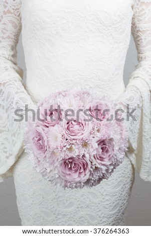 Pale lilac wedding bouquet of roses and chrysanthemum flowers