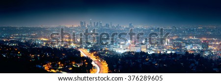 Los Angeles at night with urban buildings and highway