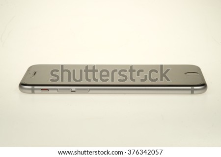 Black modern smartphone on a white background