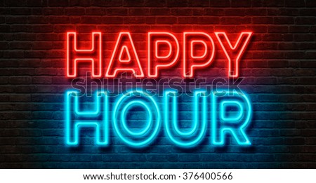 Neon sign on a brick wall - Happy Hour Royalty-Free Stock Photo #376400566