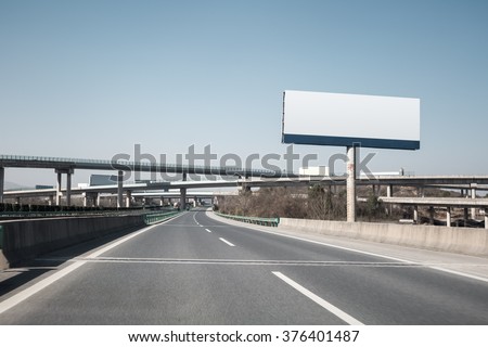 large billboards near the highway transportation hub