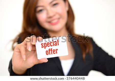 Special offer, Business woman holding a card with the words  
