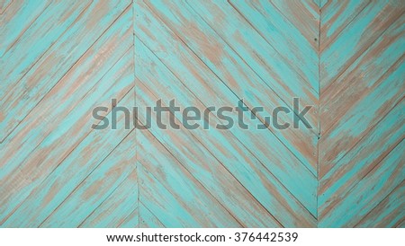texture of a wooden wall, turmalin and grey chevron wooden boards