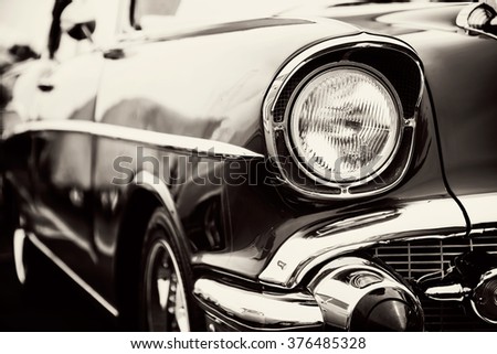 Classic car with close-up on headlights Royalty-Free Stock Photo #376485328