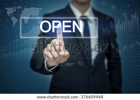 Businessman hand touching OPEN button on virtual screen