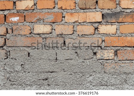 Old brick wall with cracks and scratches , background, texture 