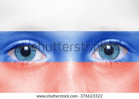 child's face with russian flag 