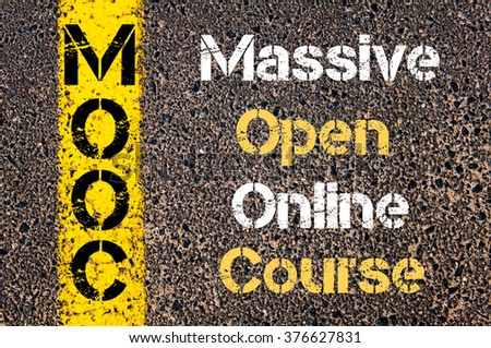 Concept image of Business Acronym MOOC MASSIVE OPEN ONLINE COURSE written over road marking yellow paint line