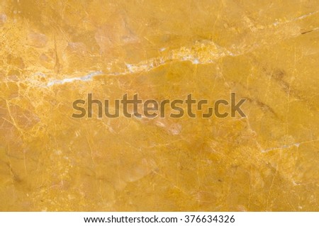 Yellow marble texture or abstract background.