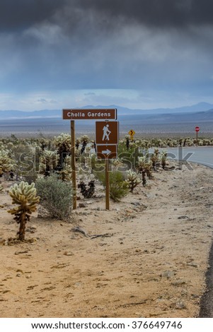 Cholla Gardens sign in a park in southern California