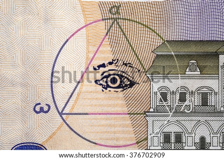 Masonic symbol image - eyes and a triangle on the banknotes