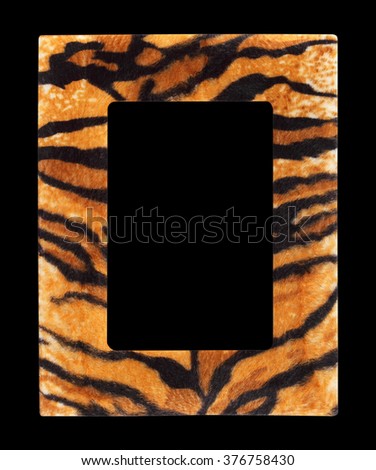 Wildlife fur tiger photo frame isolated on black background