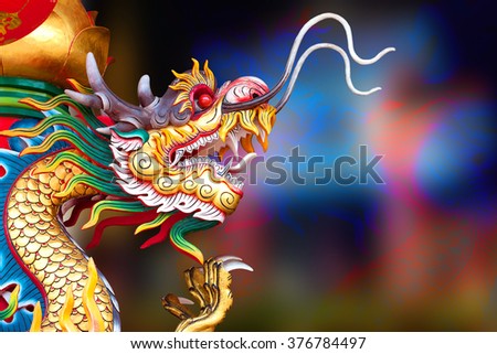 Golden dragon on background.