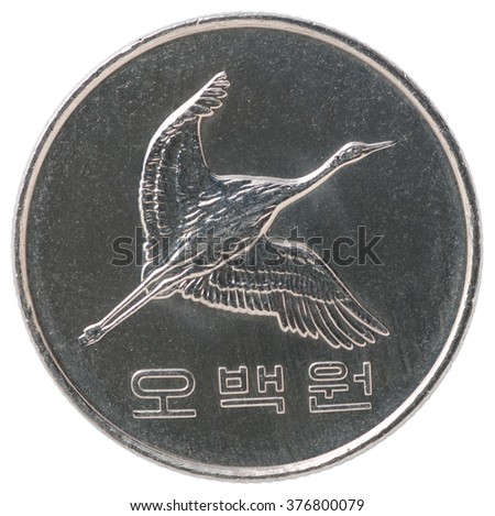 Korean coin with the image Crane isolated on white background