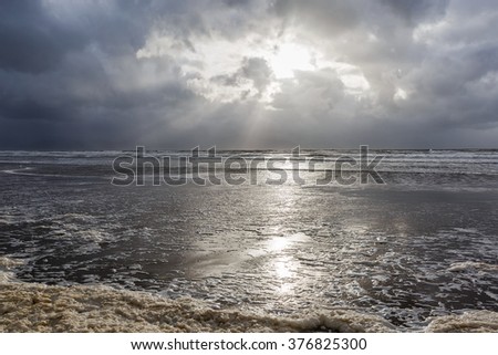Beautiful landscape of sandy beach and cloudy sky in Ireland