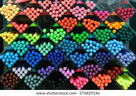 Colorful pens of many colors background.