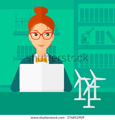Woman working at laptop. 