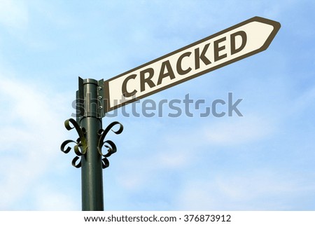 CRACKED WORD ON ROADSIGN