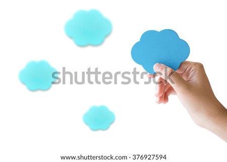 Hand holding blue cloud isolated on white background.