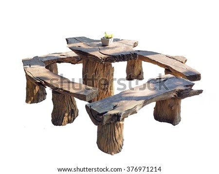 Wooden bench and table made of tree trunks isolated on white background