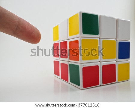 a plastic cubic toy with white background.
