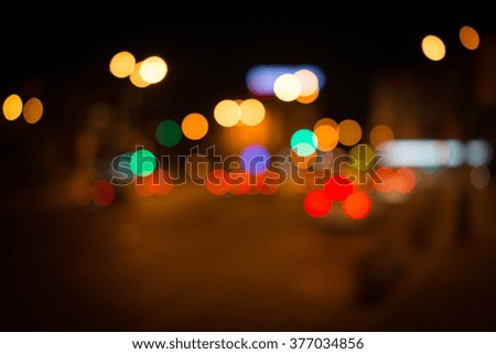 Beautiful city street lights at night (out of focus)