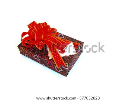 Gift with valentine card on white background