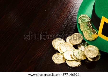 Saint Patrick's gold coins and green hat