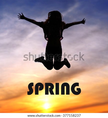Young athletic girl jumping on a background of a sunset silhouette of happy woman victory over the difficulties, advertising photos on the theme of spring