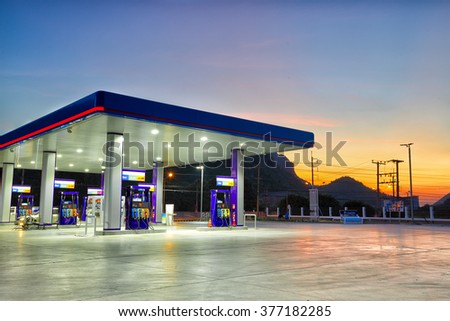 Gas station at sunset. Royalty-Free Stock Photo #377182285
