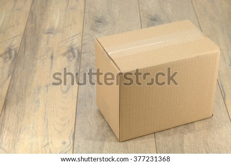 A close up shot of a cardboard box